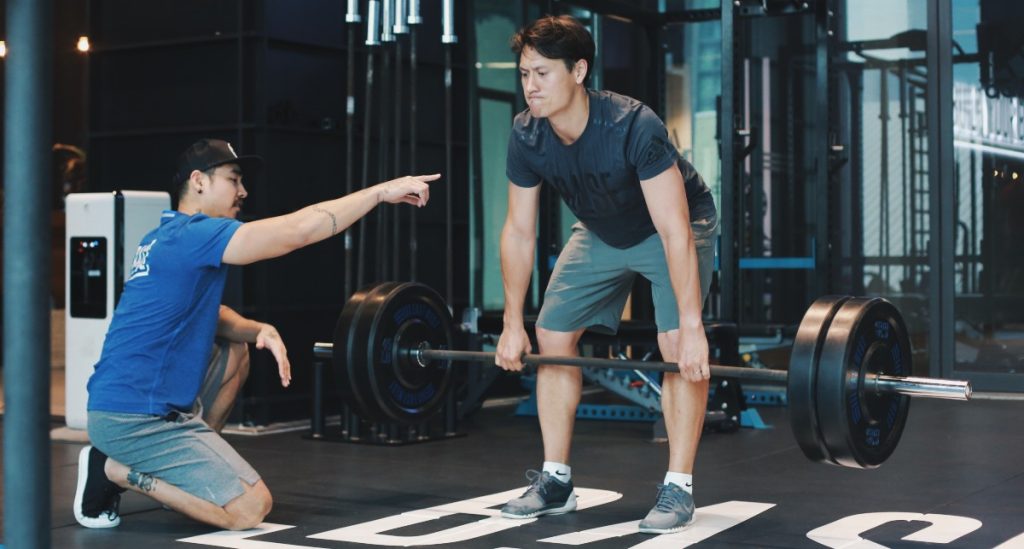 Male personal trainer at BASE gym in Bangkok, Thailand